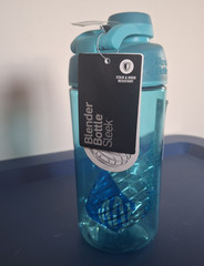 BlenderBottle Sleek 24 fl oz Blue Shaker Bottle, Screw-On Lid, Mixing Ball